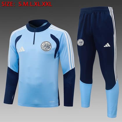 Chándal Ajax 26/27 azul claro · media cremallera
